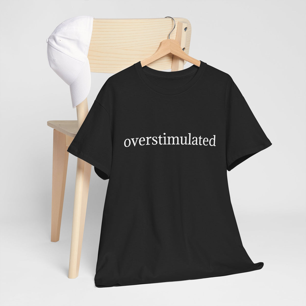 Overstimulated Tee — Minimalist Black Graphic T-Shirt